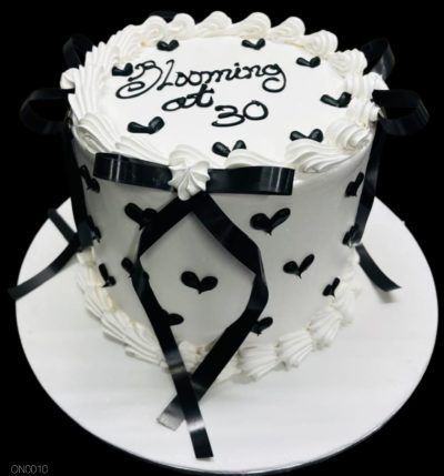 Black ribbon cream cake
